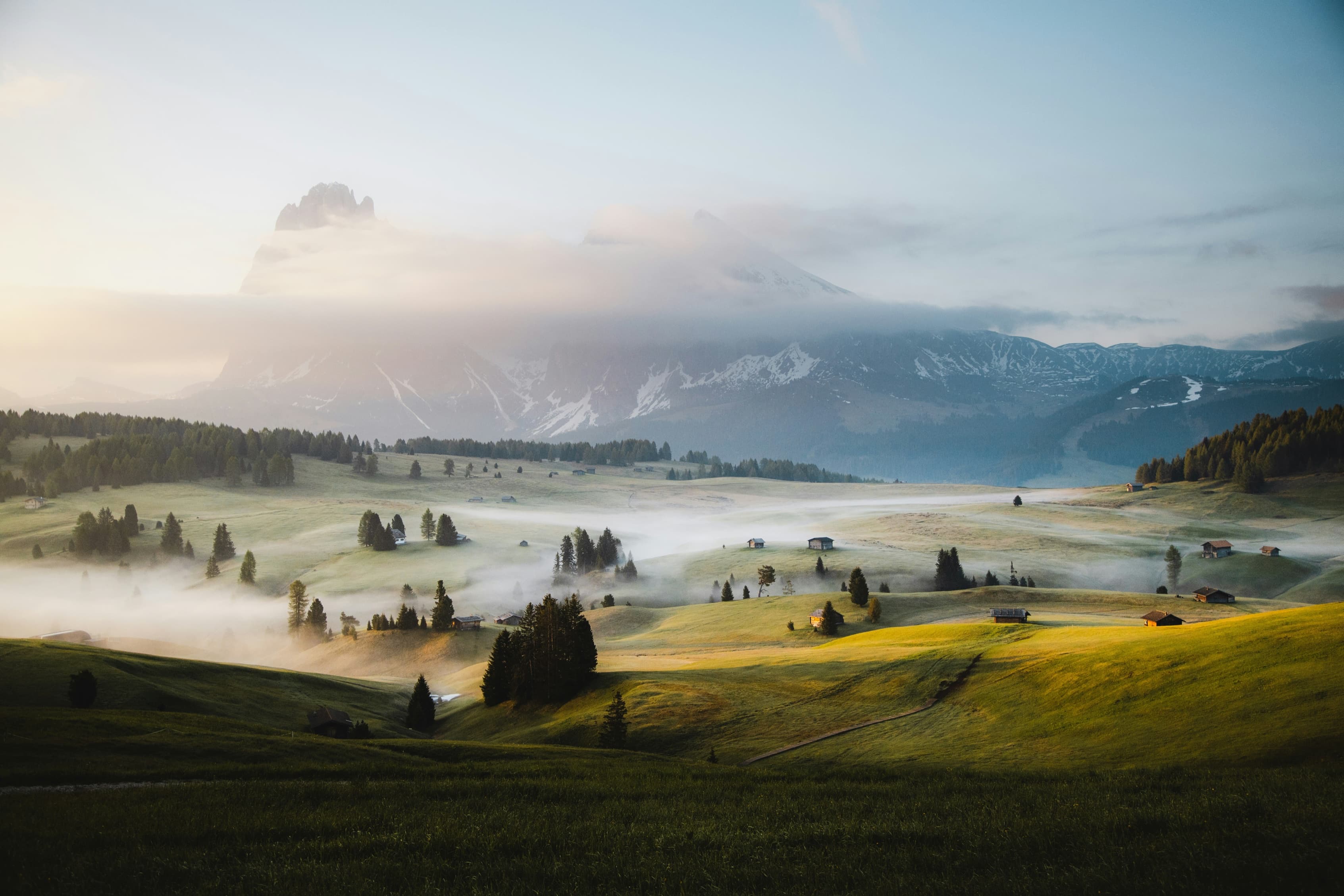 Misty mountain valley at sunrise